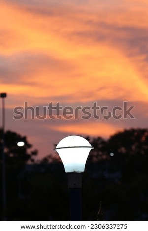 sunset photo of street lamp