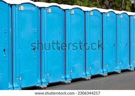 Portable wc. Public mobile toilet in the street. Transportable latrine
