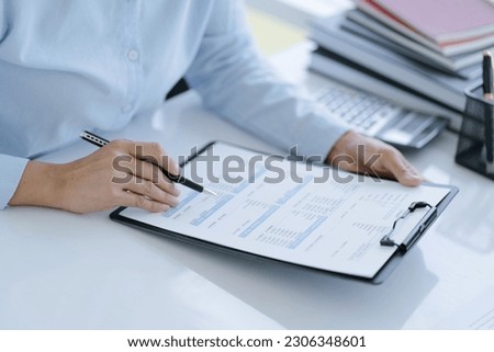 Small business accounting Businesswoman Accountant verify growing business with calculator. Accountancy Concept