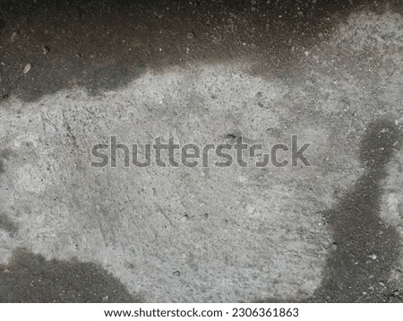 Gray concrete wall with wet spots Photo Background