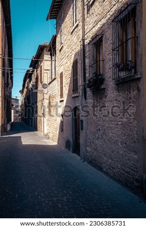 The historic downtown of Cagli village with its old houses in the Marche region of Italy