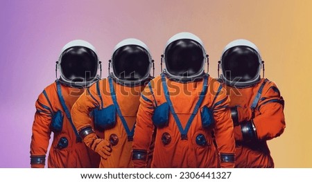 Astronauts in space suit on color background. Space crew of Artemis mission on Moon. Elements of this image furnished by NASA Royalty-Free Stock Photo #2306441327