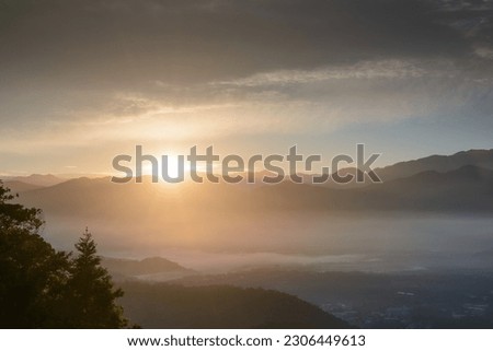 The sun was just above the ridgeline. Capture the sunrise and sea of clouds here. Jinlong Mountain, Nantou, Taiwan