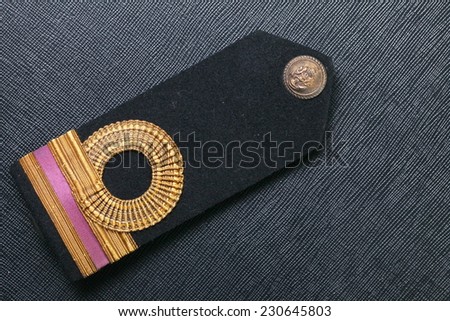Vintage and old Royal Thai Navy arm made from velvet black color and gold color cloth well-knit represent Thai navy arm accessory to use with uniform 