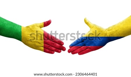 Handshake between Mali and Colombia flags painted on hands, isolated transparent image.
