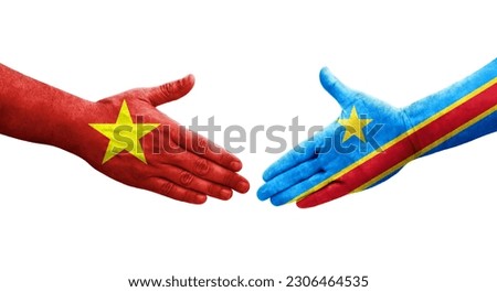 Handshake between Dr Congo and Vietnam flags painted on hands, isolated transparent image.
