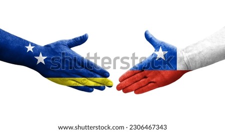 Handshake between Chile and Curacao flags painted on hands, isolated transparent image.