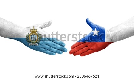Handshake between Chile and San Marino flags painted on hands, isolated transparent image.