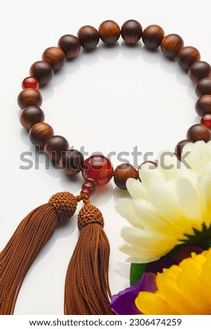 Buddhist rosary. Wooden buddhist rosary with tassel.