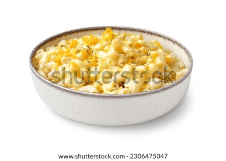 Bowl of tasty Italian pasta with Cheddar cheese on white background Royalty-Free Stock Photo #2306475047
