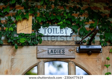 Women's Restroom Sign, Natural Black Background