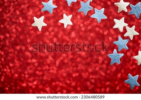 4th of July. USA Patriotic flag from blurred view of glitters and stars. Memorial, President, Labor Day background. Mock up. Patriotic day card. Bokeh background with firework and copy space.