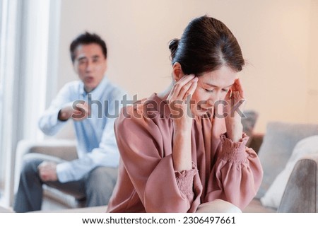 Senior couple fighting at home Royalty-Free Stock Photo #2306497661