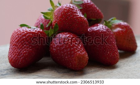 Freshly picked strawberries ready to be eaten. Natural food. Spring shots