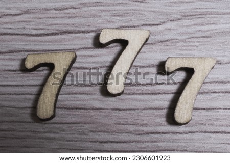 7 seven wood alphabet macro Royalty-Free Stock Photo #2306601923