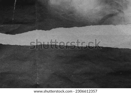 torn thin news paper overlay, dark ink on copy paper. photo layer. Royalty-Free Stock Photo #2306612357