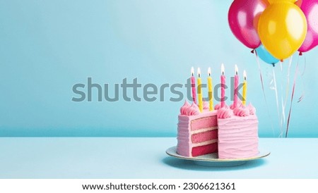 Pink birthday cake with birthday candles and pink and yellow party balloons against a blue background