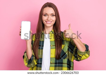 Photo of beautiful youngster girl wear yellow checkered shirt thumb up recommend new app order different food isolated on pink color background