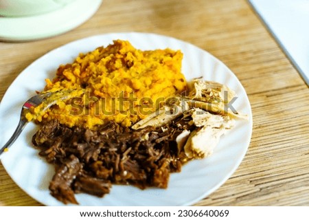 Lentil porridge with white chicken meat and meaty beef