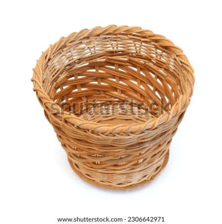 Empty wooden fruit or bread basket on white background  Royalty-Free Stock Photo #2306642971