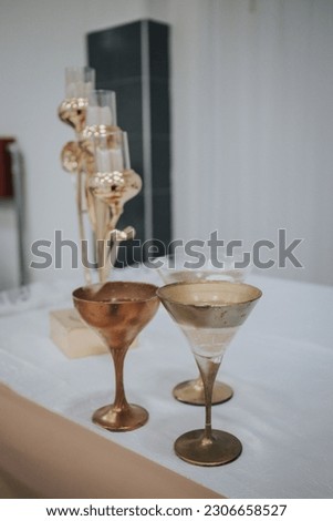 A closeup of wine glasses on table