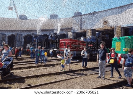Railway day with steam trains in the depot with tourists and spectators