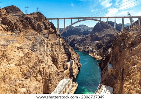 Mike O'Callaghanâ€“Pat Tillman memorial bridge in Colorado river at Nevada and Arizona border, USA Royalty-Free Stock Photo #2306737349