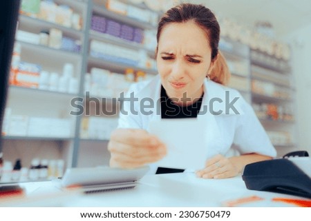 
Pharmacist Having Problems Reading Doctor Handwriting on a Prescription. Drugstore worker struggling to understand poorly written recipe 
 Royalty-Free Stock Photo #2306750479