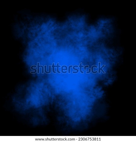 Blue color powder explosion isolated on black background. Royalty high-quality stock photo image Freeze motion of blue powder exploding. Colorful dust explode. Paint Holi, dust particles splash