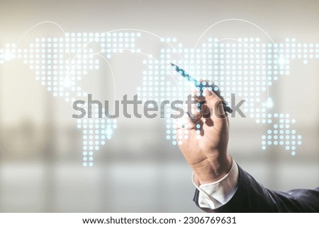 Man hand with pen working with abstract virtual world map with connections on blurred office background, international trading concept. Multiexposure