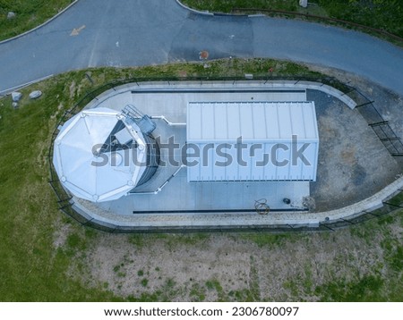 Photo of a blue steel, metal, industrial water tank, industries, commercial, municipal.
