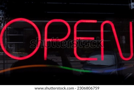 Neon Open Sign in Store Window