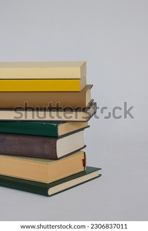 Stack of books and other materials for education, reading book or magazine, top view, isolated on white
