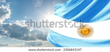 Flag of Argentina The national flag of the Argentine Republic is a triband, composed of three equally wide horizontal bands coloured light blue and white. Royalty-Free Stock Photo #2306843147