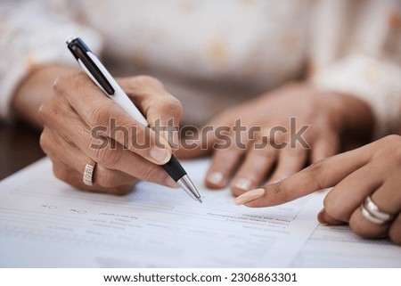 Hands, pen and closeup of a woman signing a document, contract or application with an advisor. Zoom of a female person with a signature for paperwork, form or agreement with a professional lawyer.