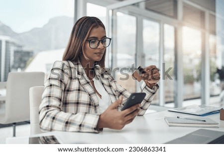 Business, cellphone and woman with a credit card, online shopping and ecommerce in a modern office. Female person, employee and agent with payment, smartphone and internet connection for transaction