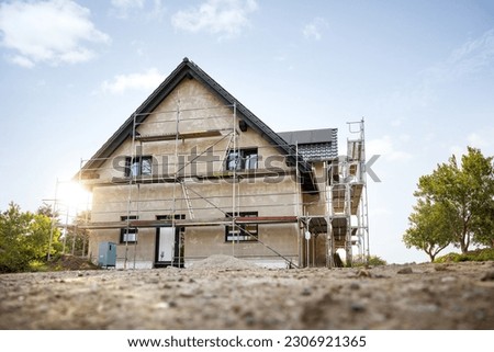 Exterior of a single family house under construction Royalty-Free Stock Photo #2306921365