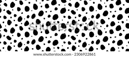 Grunge spots hand drawn vector seamless pattern. Blobs and blotches horizontal banner. Irregular organic dots and blots ornament. Cheetah spots black print. Seamless pattern with scattered round dots. Royalty-Free Stock Photo #2306922861