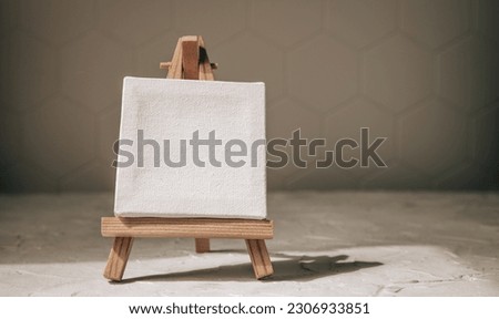 Easel for drawing on. gray background with copy space. drawing concept