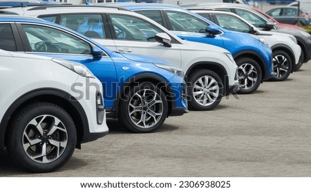 row of used cars. Rental or automobile sale services Royalty-Free Stock Photo #2306938025