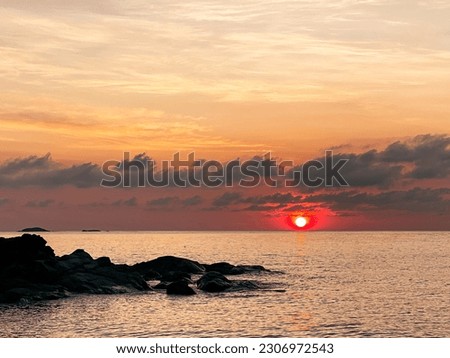 Beautiful sunrise at the beach stock photo
