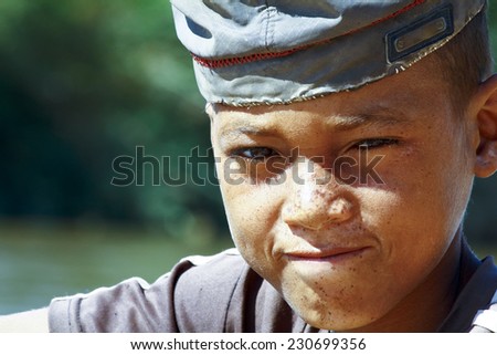 Photo of adorable young happy boy - african poor child