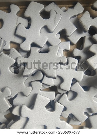 Puzzle pieces of cubism arte in white background  Royalty-Free Stock Photo #2306997699