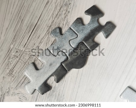 Puzzles pieces of cubism art in white background  Royalty-Free Stock Photo #2306998111