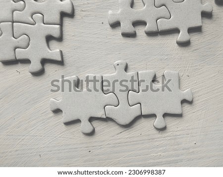 Puzzles pieces of cubism art in white background  Royalty-Free Stock Photo #2306998387