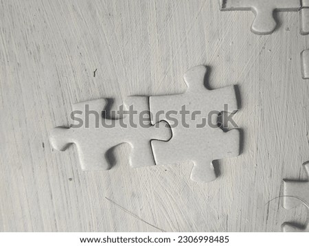 Puzzles pieces of cubism art in white background  Royalty-Free Stock Photo #2306998485