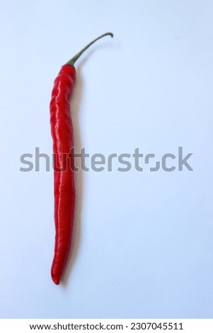 An individual ripe chili pepper isolated on a white background, allowing for easy editing with the included Clipping Path