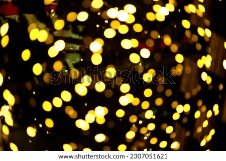blur bokeh circus tube lamp hang from ceiling in dark room like firefly Royalty-Free Stock Photo #2307051621