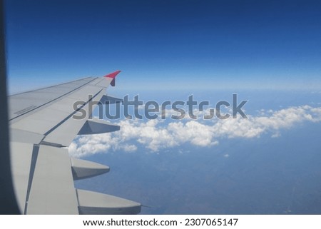 Picture from a plane above the clouds