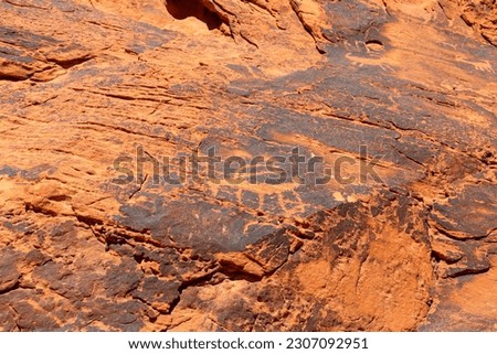 Native American petroglyphs at Valley of Fire State Park in a sunny day, Nevada, USA